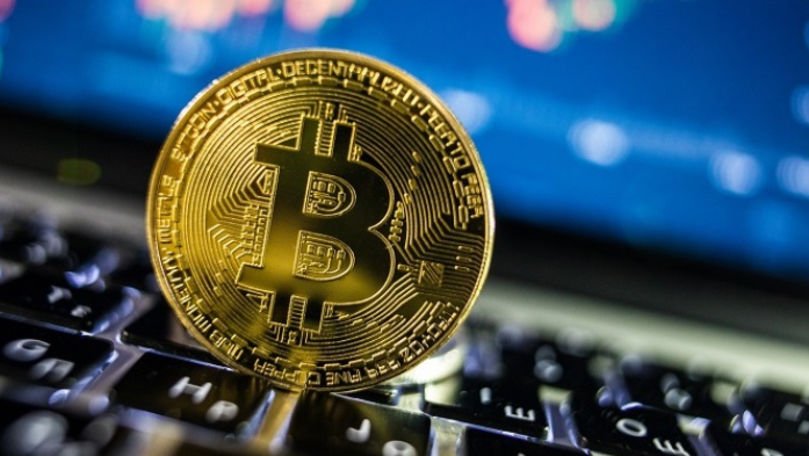 Bitcoin a atins un nou record: Criptomoneda a depășit pragul de 60.000 de dolari