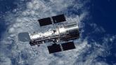 Telescopul Hubble a fotografiat ochiul unei galaxii din spațiul îndepărtat foto-04